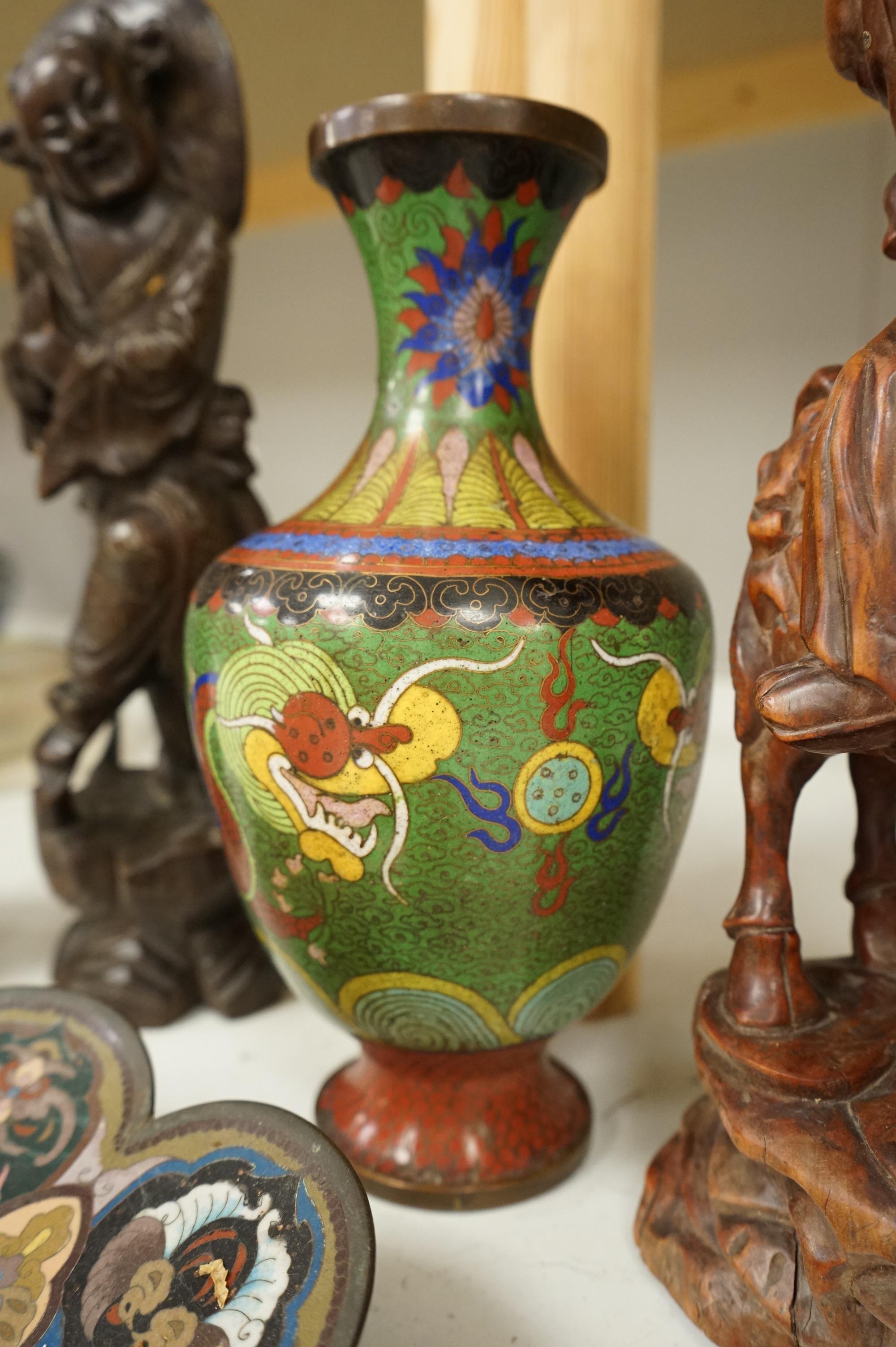 A Japanese cloisonné enamel dish, a Chinese cloisonné enamel vase and three Chinese carved wood figures, largest 39cm high